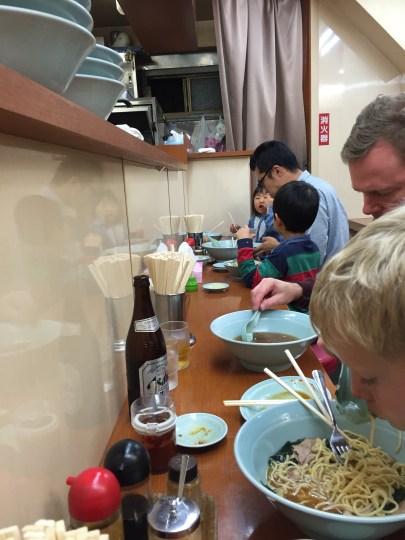 Spying on a Japanese dad and two small kids--white rice and noodles all around!